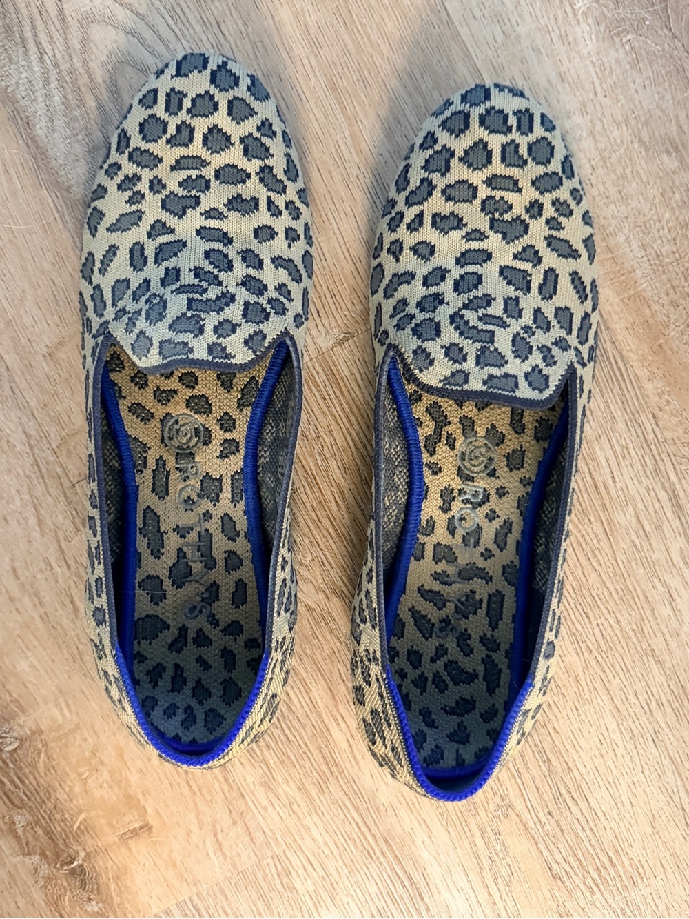 Rothy's Leopard Print Knit Slip-On Flats in Beige and Black with Blue Trim